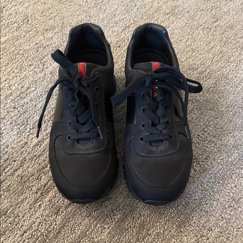 Prada Black Sneakers LIKE NEW.  Equivalent to woman's size 9.
